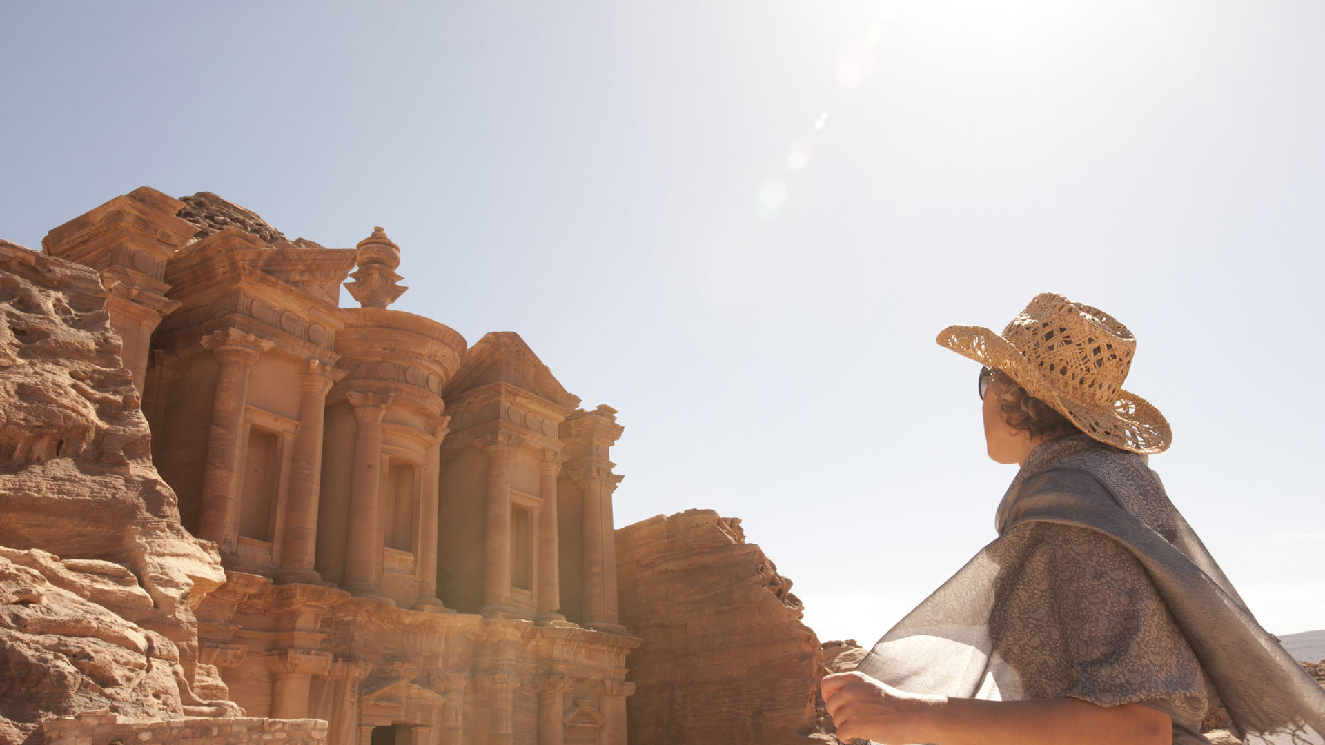 Woman traveller at ruin. Ed Deir, the monastery.Jordan,Petra
